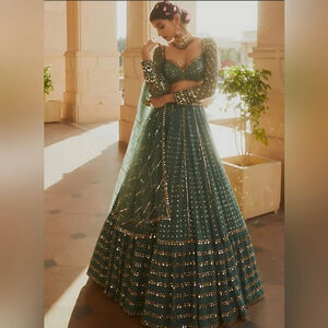 Faux Gorgeous Sequence Green Lehenga Choli